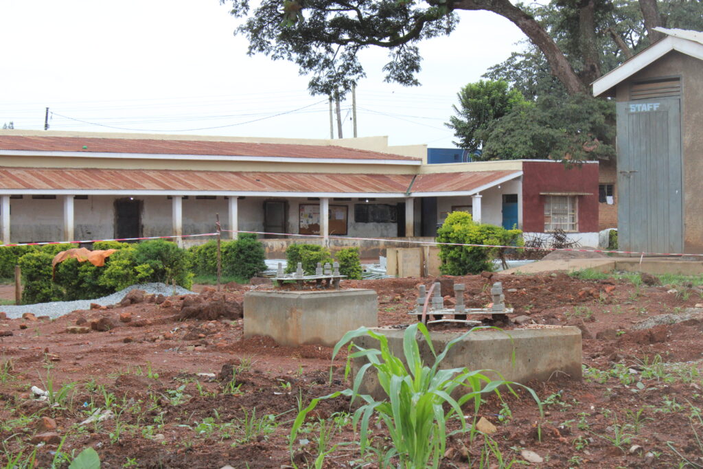 Construction of the mast at Hoima Public Primary School had reached surface level of the mast foundation where concrete pillars with metals had been already affixed on Tuesday. Photo by Robert Atuhairwe.