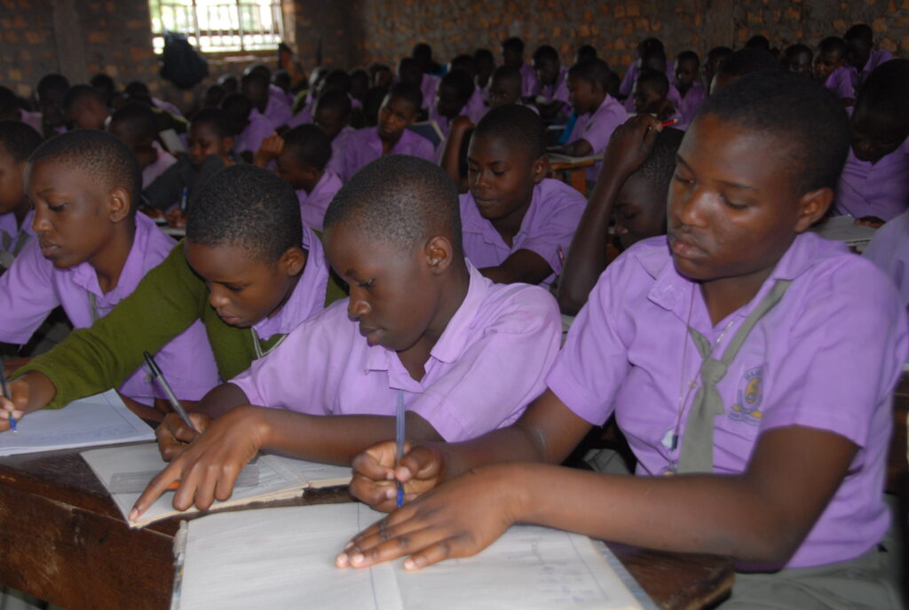 Students of Mandela Secondary in Hoima City attending to a lession. Photo by Robert Atuhairwe.