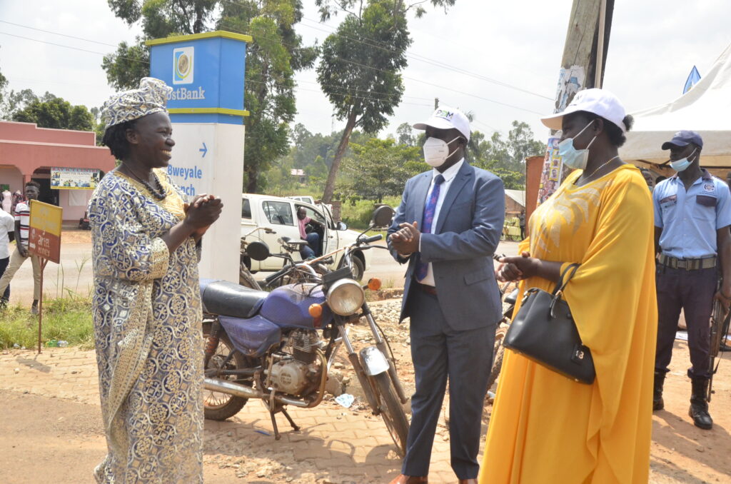 Edith ALiguma, the LC5 Chairperson (right) and Dan Muganga the RDC Kiryandongo (middle) welcoming minister Namuyangu on Wednesday. Photo by Moses Muruli.