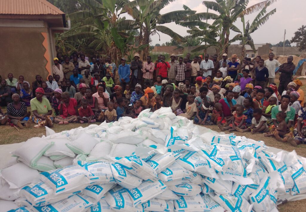 Evicted residents waiting for food donation in Kikuube on January 14. Credit: Robert Atuhairwe/ The Albertine Journal