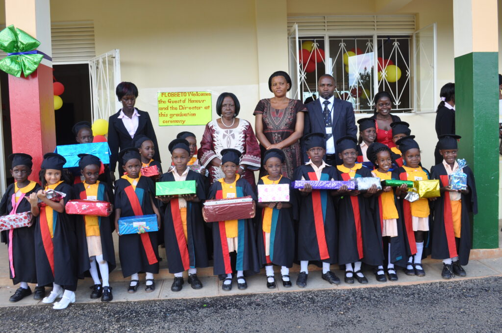 Pupils of Flobbeto Nursery and Primary School in Hoima City who graduated from Kindergarten in 2014. Credit: Robert Atuhairwe/The Albertine Journal