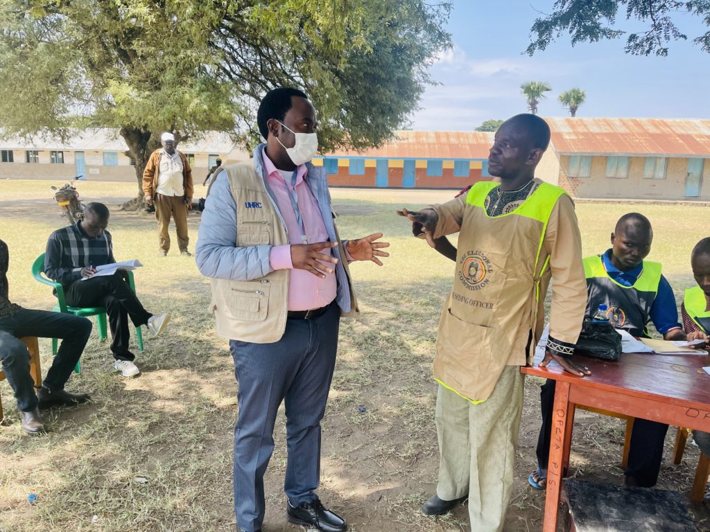 Member of Uganda Human Rights Commission, Crispin Kugiza Kaheru (wearing a mask) is among the 90 election observers deployed to oversee the February 25, 2023, polls in Nigeria, which will see Nigerians elect a president and vice.