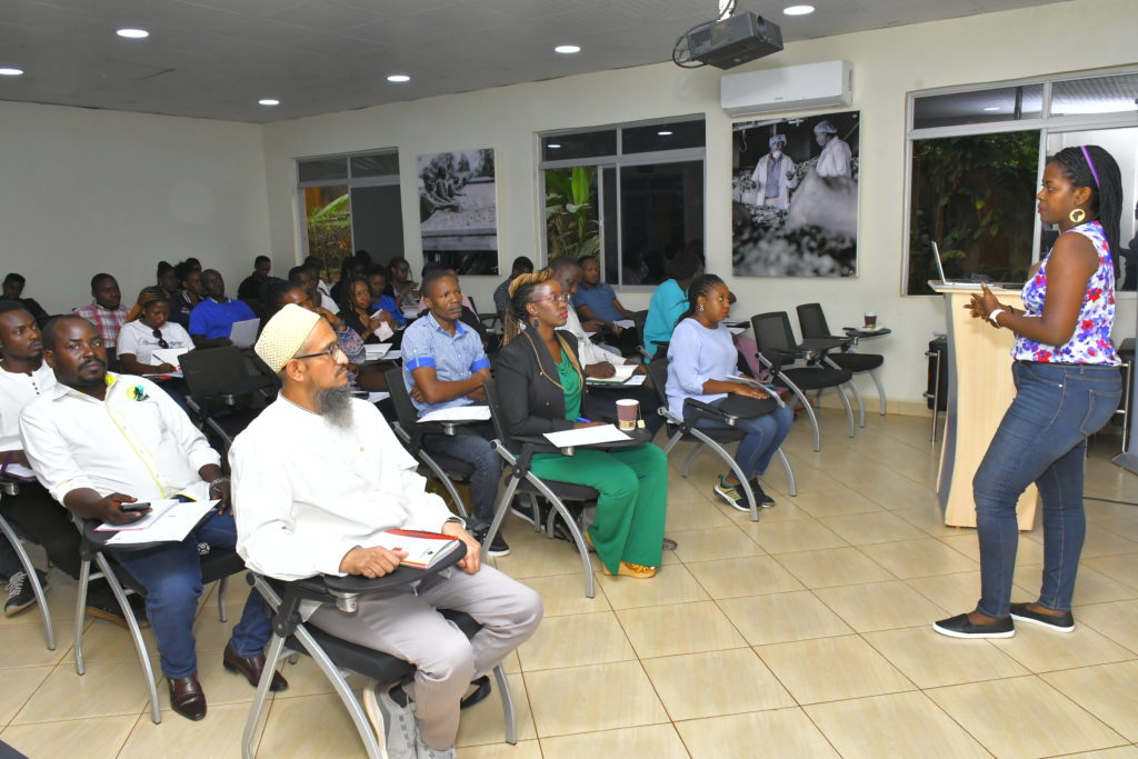 Sheila Agaba, the Business Manager at Stanbic Incubator, briefing trainees at the incubator's office in Kololo on Monday, February 20, 2023.