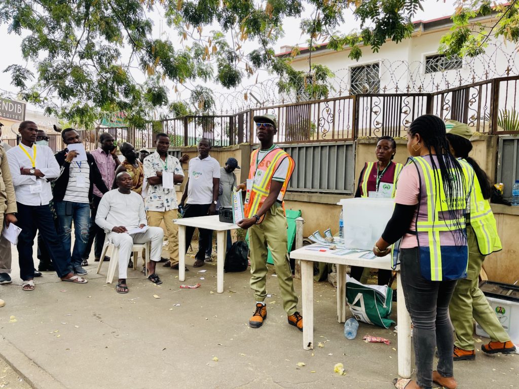 A polling official counts the ballots cast in the Municipal, Abuja. Photo Credit: Crispin Kaheru