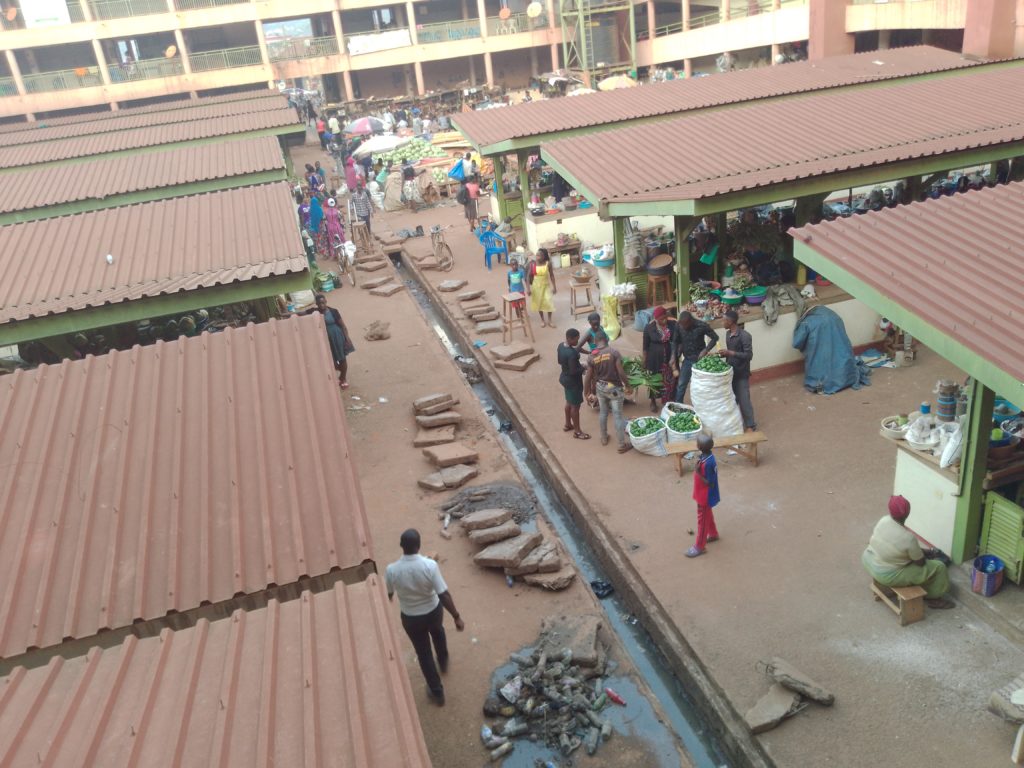 There is always delays in empting the septic tank at Hoima central market which leaves the faecal matter flowing in the market and around the parking area. Credit: Peace Lawrence Ayesigwa/The Albertine Journal