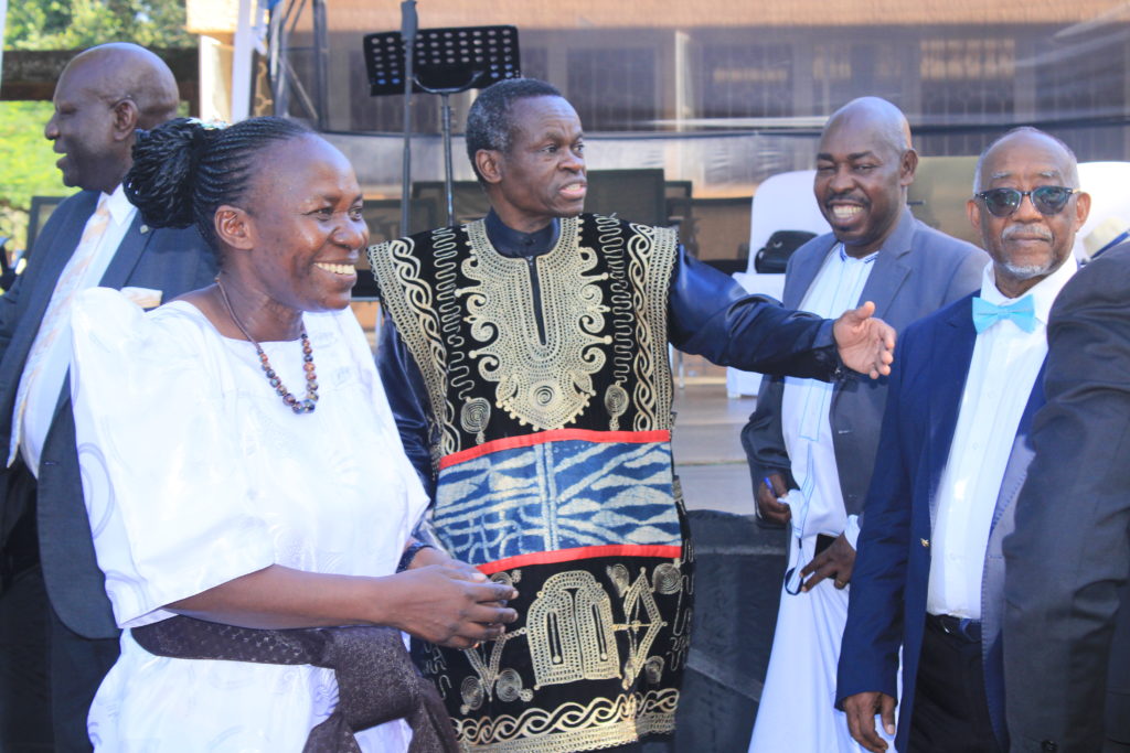 Professor Patrick Loch Otieno Lumumba (M) interacts with Bunyoro-Kitara Kingdom officials, government officials and residents after a public lecture at Bunyoro-Kitara Kingdom Rukurato (parliament) courtyard in Hoima City on June 8, 2023. Photo: Robert Atuhairwe/The Albertine Journal.