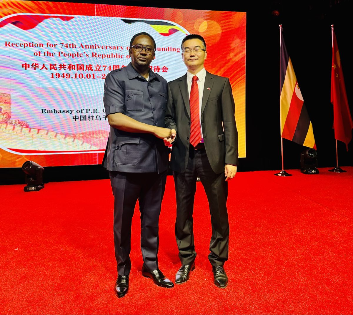 Uganda Human Rights Commissioner Crispin Kaheru (L) and Deputy China Ambassador to Uganda H.E Fan Xuecheng (R) at the 74th Anniversary of the Founding of PR China.