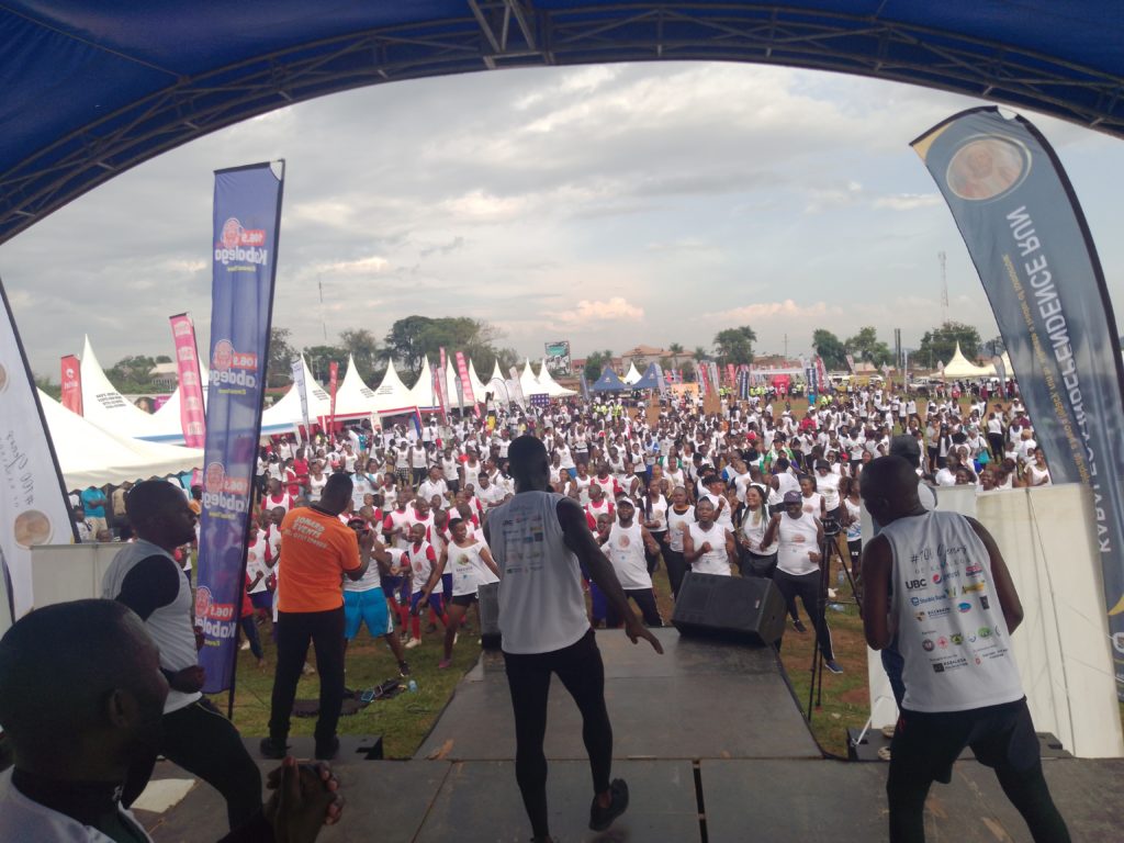 Residents takes part in aerobics after the run at Hoima Boma grounds. Photo: Peace Lawrence Ayesigwa.