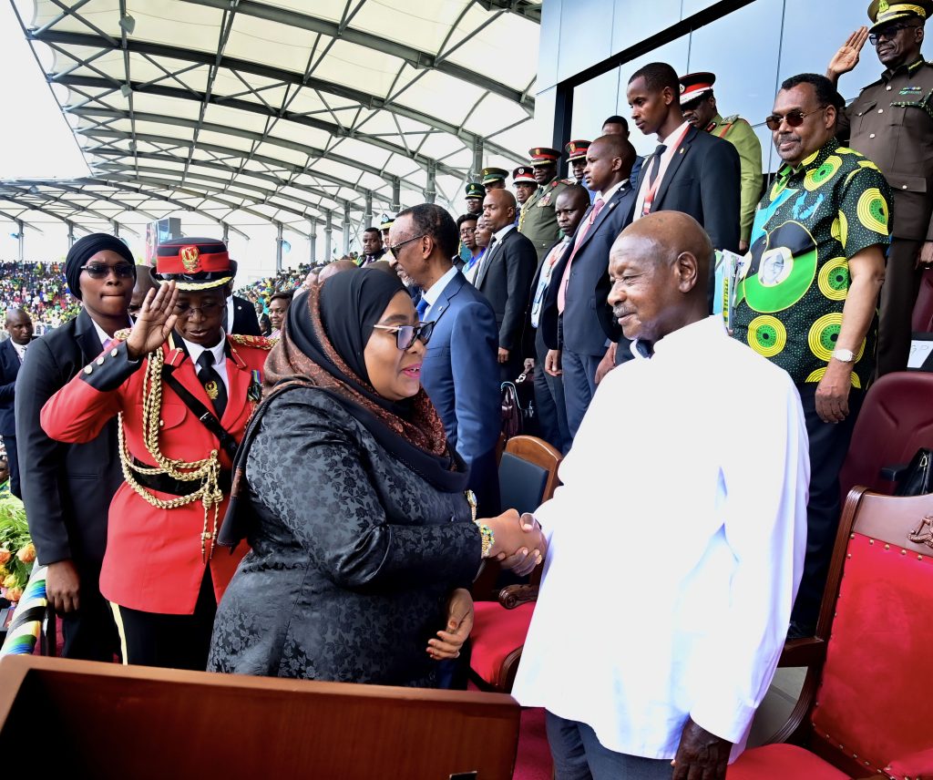 Ugandan President warmly greets Tanzanian counterpart Samia Suluhu Hassan. Courtesy Photo.