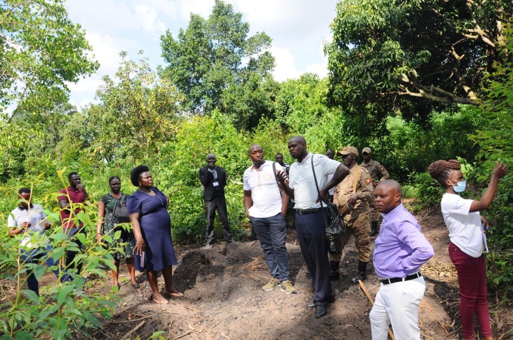 Journalists with officials from The Cross-Cultural Foundation of Uganda (CCFU) during a field tour in Kagadi town council. Credit: CCFU.