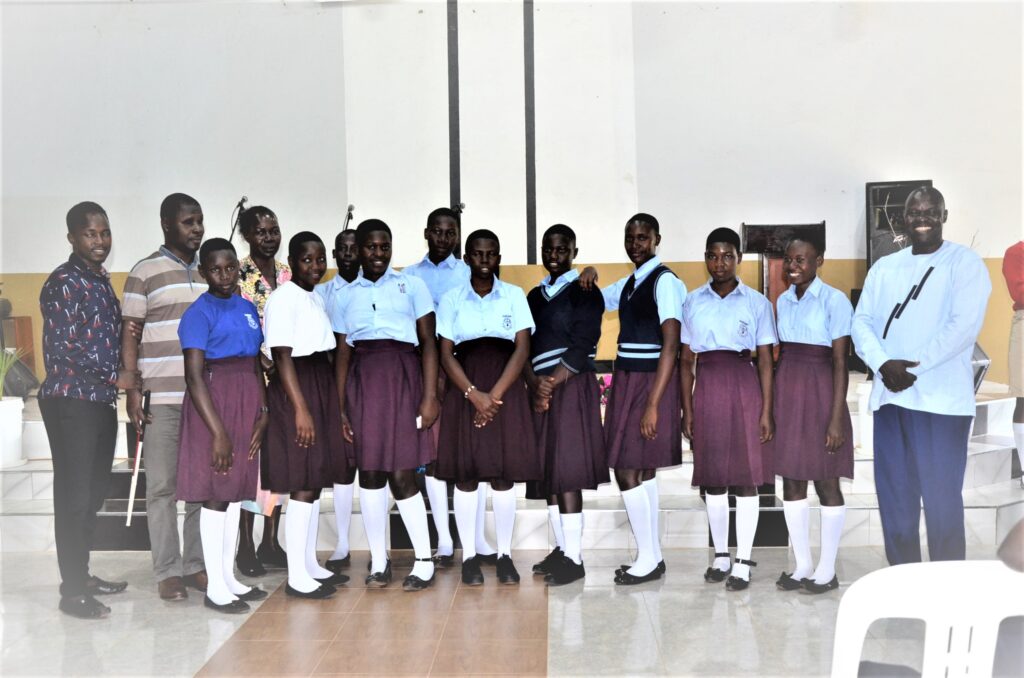 Students Christian High Secondary in a group photo with the facilitators. Photo: Yosam Gucwaki/The Albertine Journal