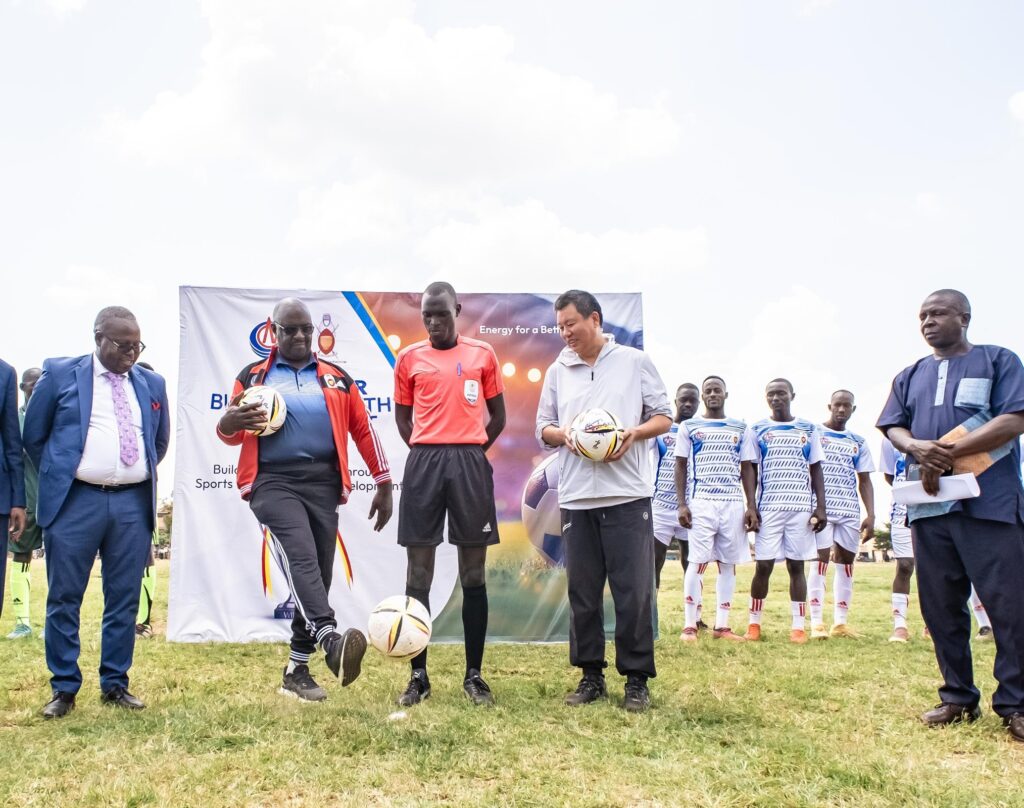 Andrew Byakutuga, Prime Minister of Bunyoro-Kitara Kingdom kicks the ball to launch the tournament. Credit: Courtesy.