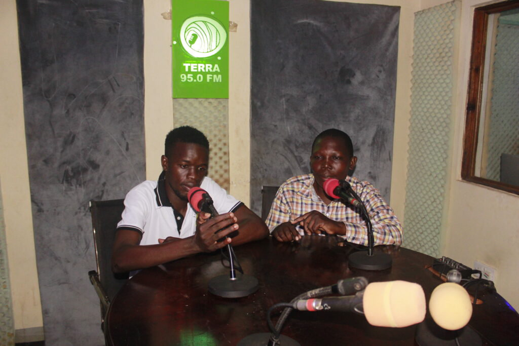 Abati Iniesta (left) with Samuel Jaryekonga Warom, a Communications Director of Environmental Defenders in the Congo Basin presenting on Terra FM. Credit: Environmental Defenders.