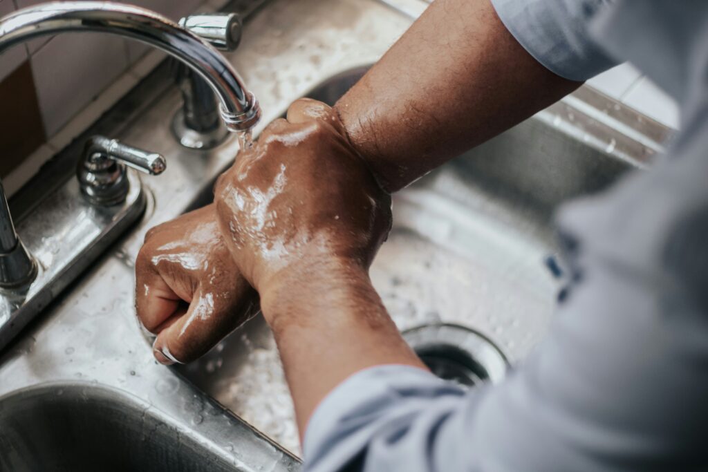 The outbreak in Lamwo has been attributed to poor sanitation and hygiene practices, including contaminated water sources and open defecation without washing hands. Credit: Net.